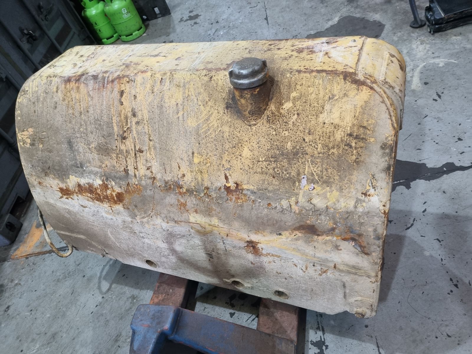 Earth-moving machine fuel tank – before photo 6