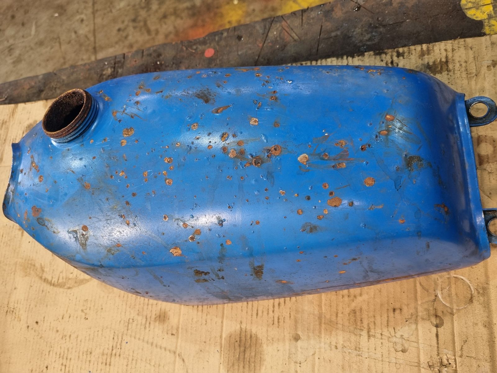 Motorcycle tank pitting repair – before photo 1