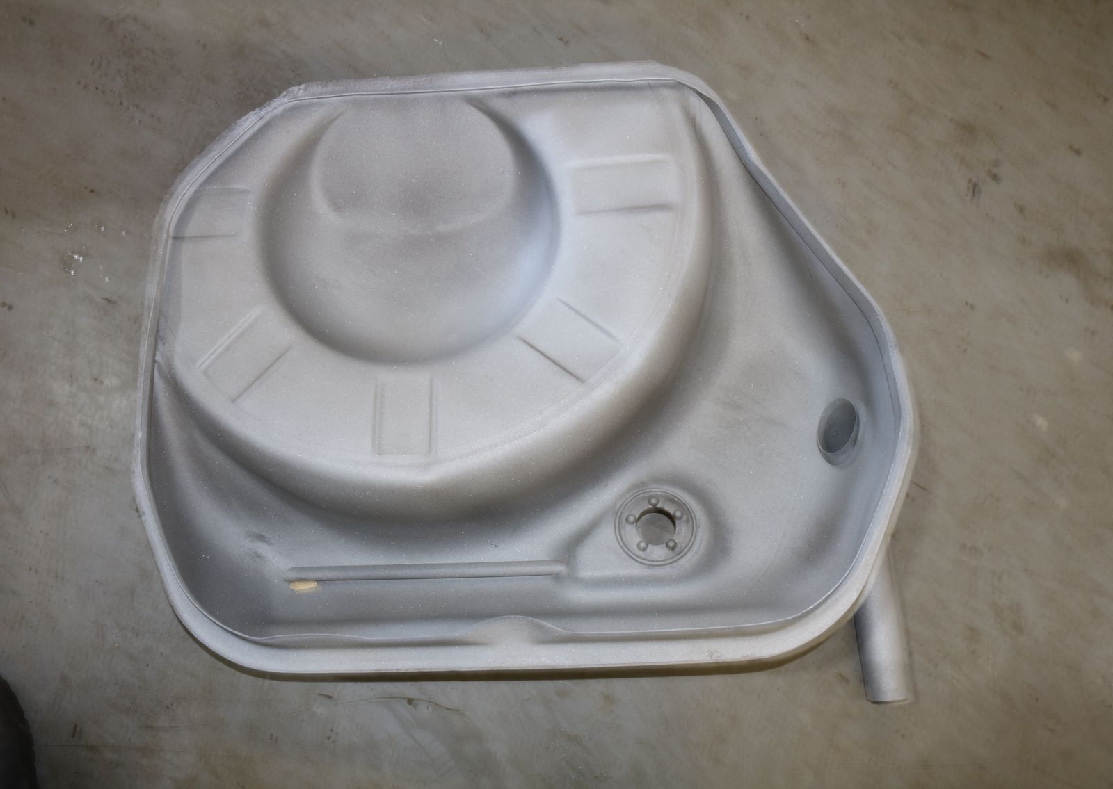 Old car fuel tanks: split open and sandblasted – sandblasted tank half 4